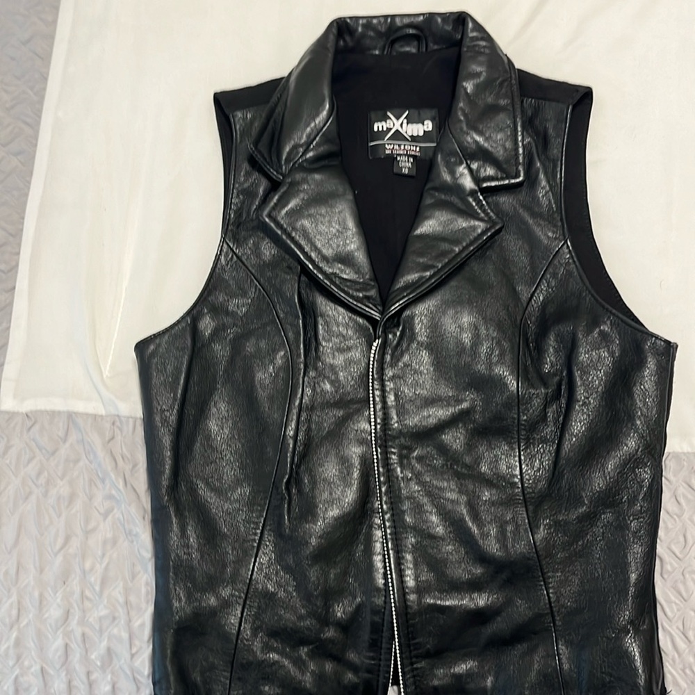 Leather Vest by Wilson’s for Maxima.